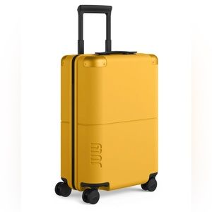 July Carry On Luggage in yellow NEW NEVER USED